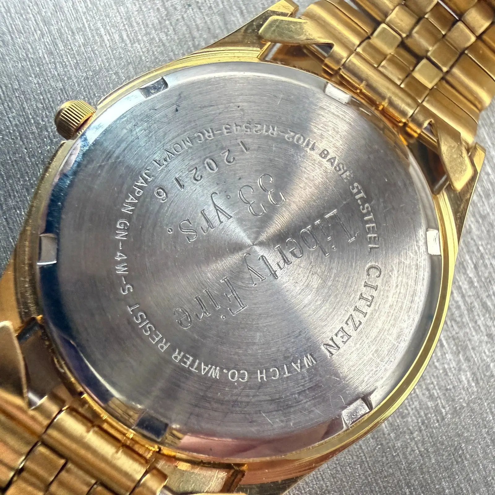 Citizen CQ Watch Men 35mm Blue Dial Gold Tone Daydate Round 1102-R12543 New Batt10