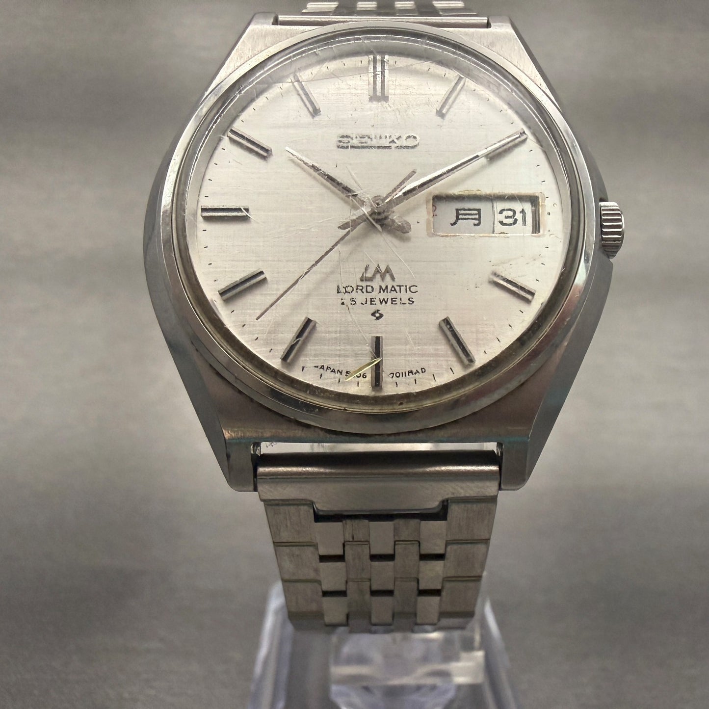Seiko Lord Matic Watch Men 37mm Silver Dial Silver Tone Daydate Round 5606-70105