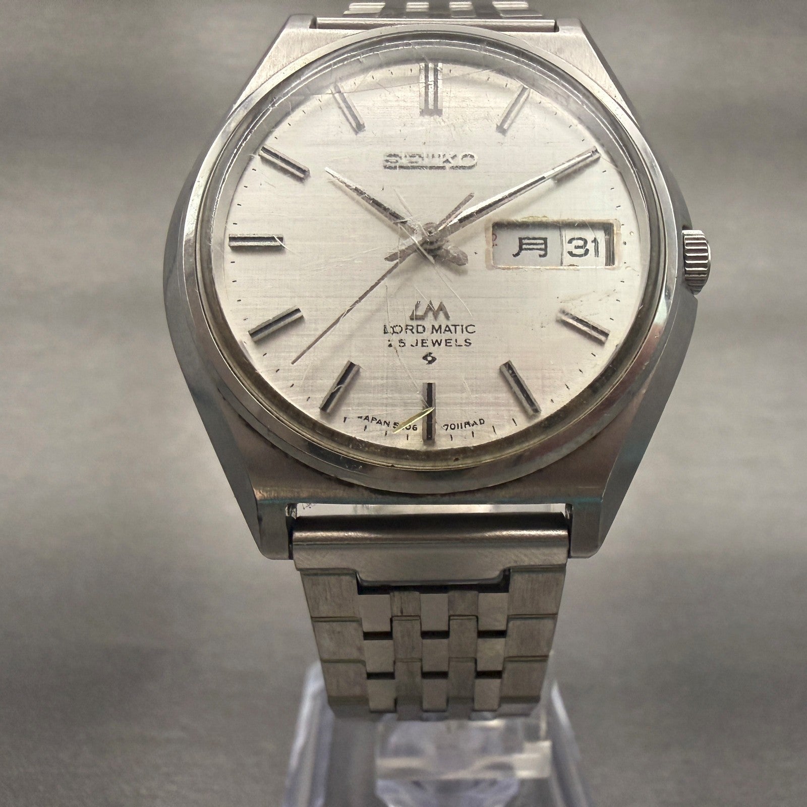 Seiko Lord Matic Watch Men 37mm Silver Dial Silver Tone Daydate Round 5606-70105