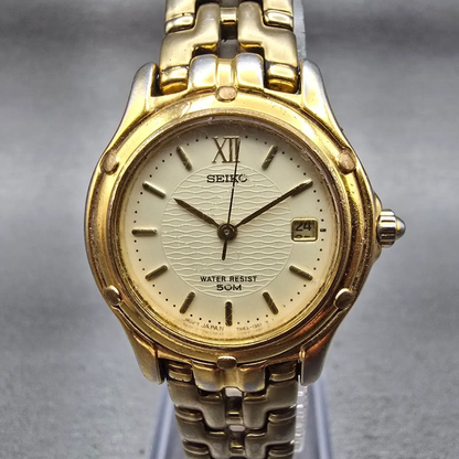 Seiko Watch Women 26mm Champagne Dial Gold Tone Date Round 7N82-0599 New Battery0