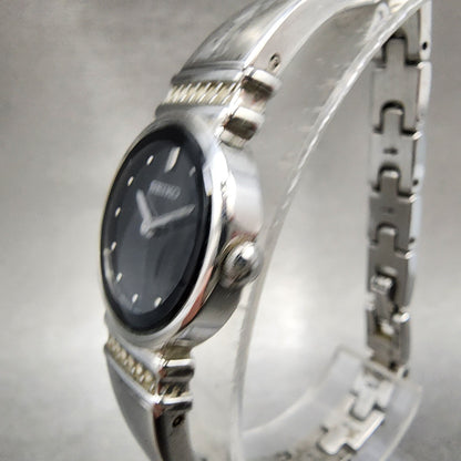 Seiko Watch Women 21mm Black Dial Silver Tone Round 1N000SC0 New Battery2