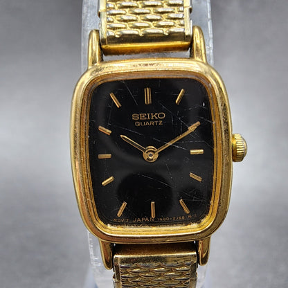 VTG Seiko Watch Women 17mm Black Dial Gold Tone Rectangle 1N00-5K29 New Battery