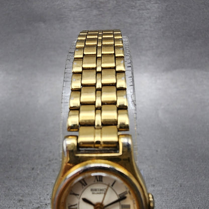 Seiko Watch Women 18mm White Dial Gold Tone Oval V4015109 New Battery VTG4