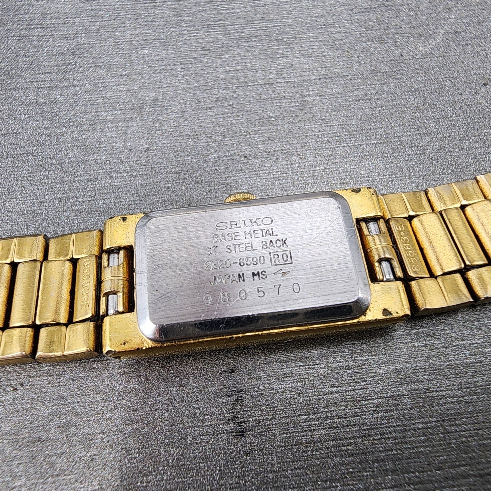 Seiko Tank Watch Women 13mm Black Dial Gold Tone 2e206590 New Battery9