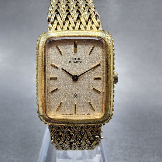 Seiko Tank Watch Women 19mm Champagne Dial Gold Tone 14005140 New Battery0