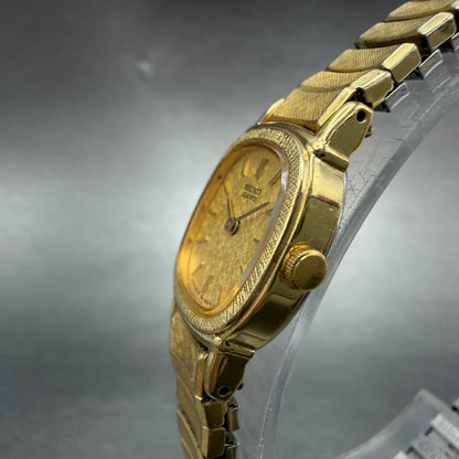 Seiko Watch Women 17mm Champagne Dial Gold Tone Rectangle 2Y00-5028 New Battery62