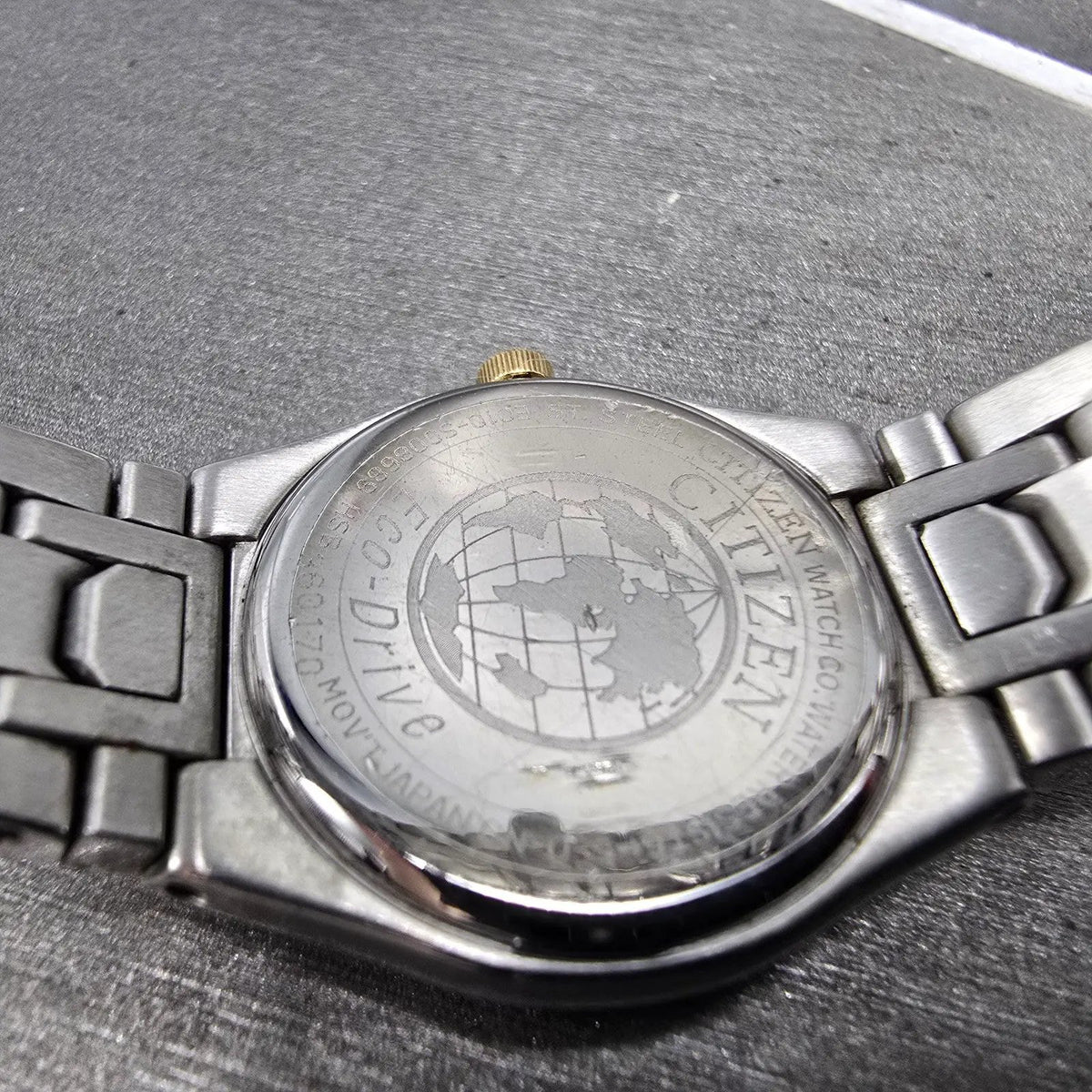 Citizen Eco-Drive Watch Women 25mm White Dial Two Tone Date E010-S008689 Works K9