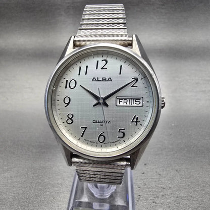 Seiko Alba Watch Men 35mm Silver Dial Silver Tone Daydate Y504-8010 New Battery0