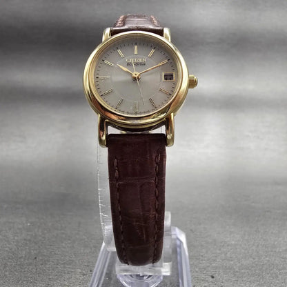 Citizen Eco-Drive Watch Women 23mm Silver Dial Gold Tone Date E011-S049423 Works5