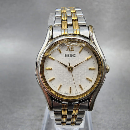 Seiko watch Women 24mm White Dial Two Tone Round V4011630 New Battery VTG0