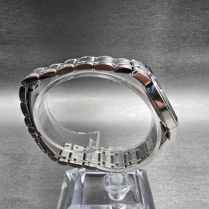 Bulova Watch Women 32mm MOP Dial Silver Tone Date Round 96M140 New Battery8
