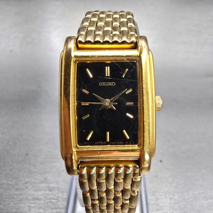 Seiko Watch Women 18mm Black Dial Gold Tone Rectangle V401-5650 New Battery VTG0