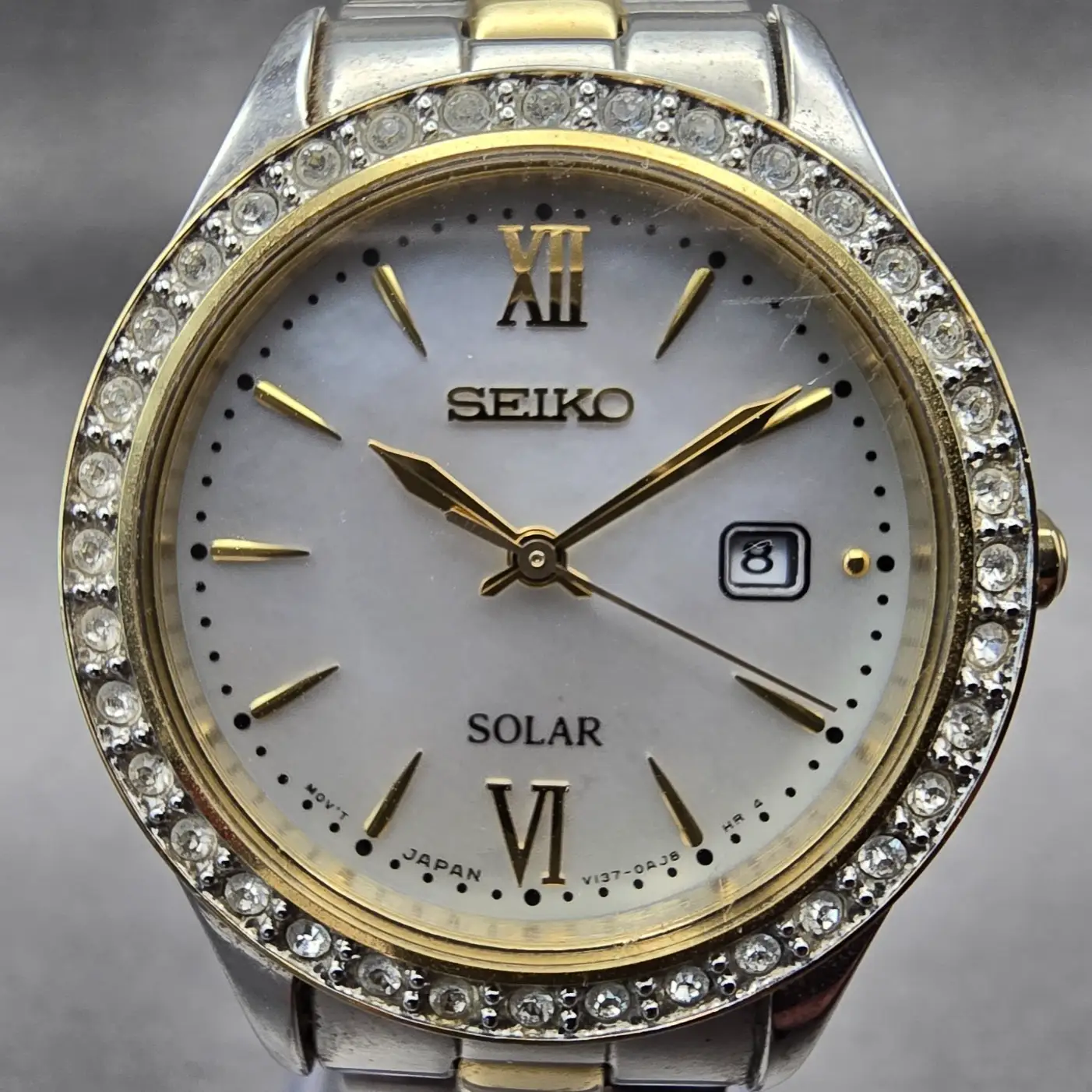 Seiko Solar Watch Women 28mm MOP Dial Two Tone Date Gemmed Round V137-0AA0 Works1