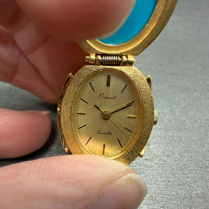Orient Ring Watch Women 17mm Gold Dial Gold Blue Stone Hideaway A054A1-30 PARTS0