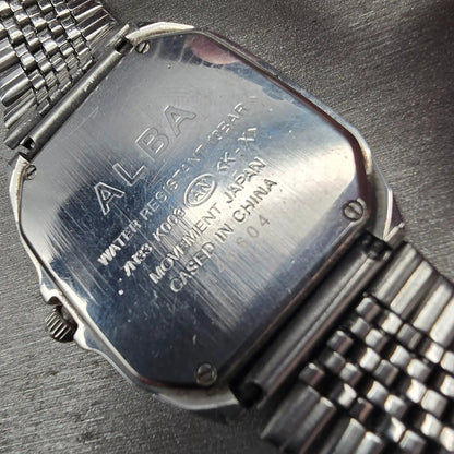 Seiko Alba Watch Men 32mm Silver Dial Silver Tone Daydate 7N33-K003 New Battery10