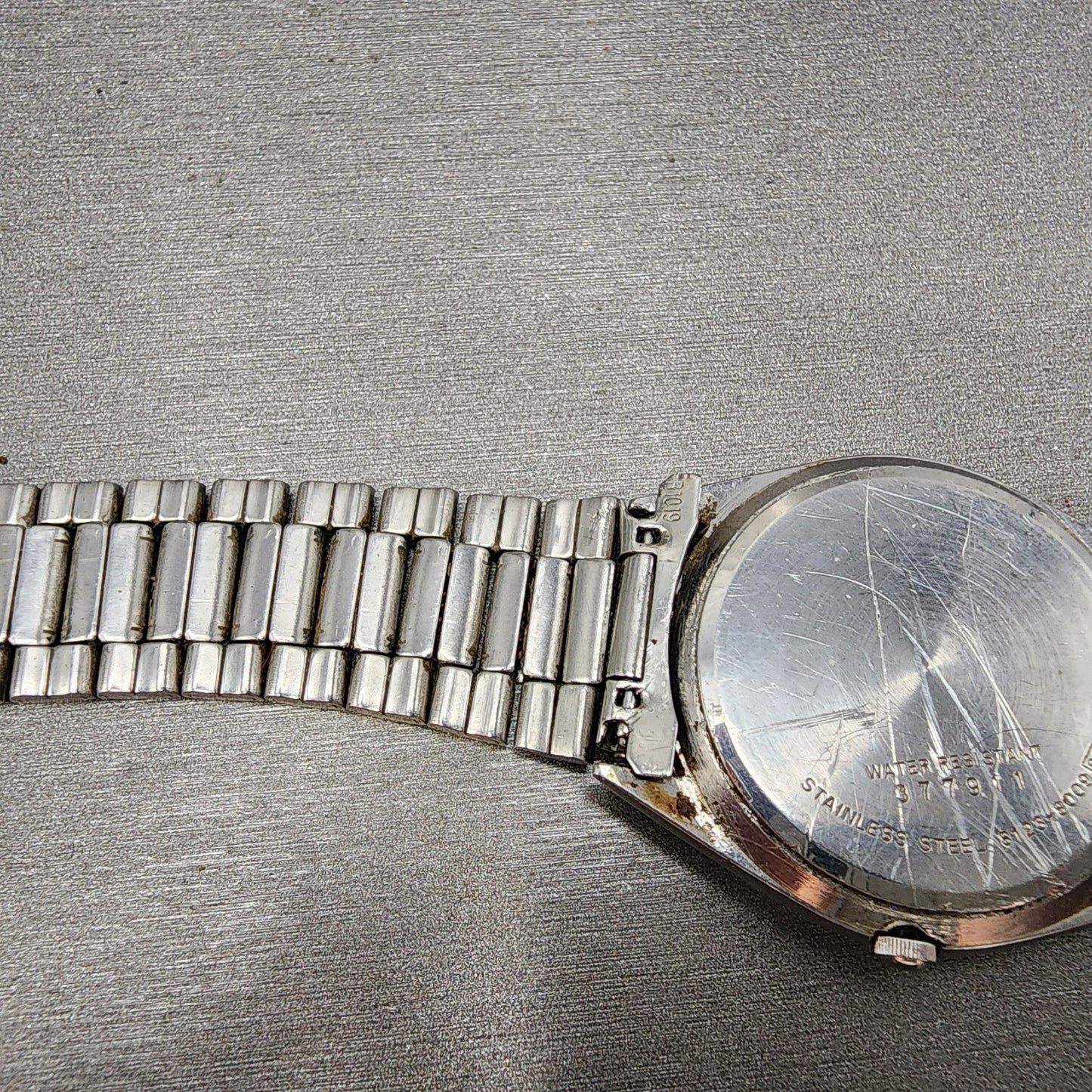Seiko SQ Watch Men 34mm Silver Dial Silver Tone Daydate 81238009 PARTS11