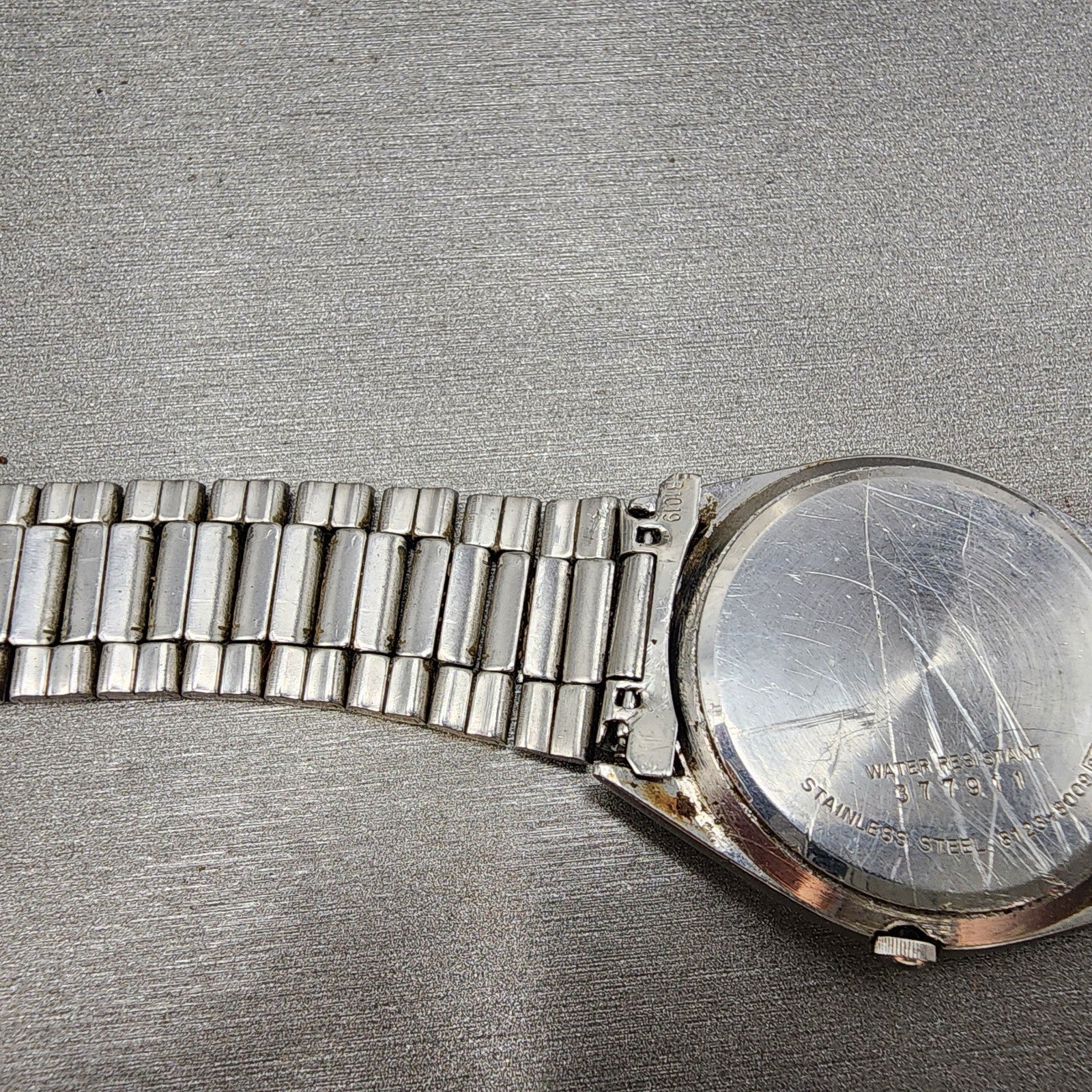 Seiko SQ Watch Men 34mm Silver Dial Silver Tone Daydate 81238009 PARTS11