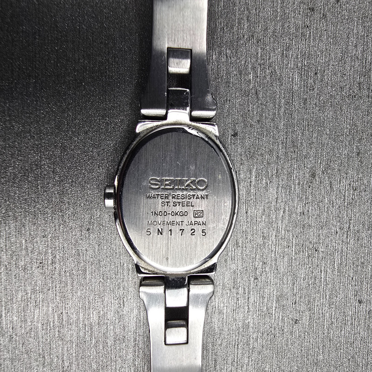 Seiko Watch Women 17mm Black Dial Silver Tone Oval 1N00-0KG0 New Battery10