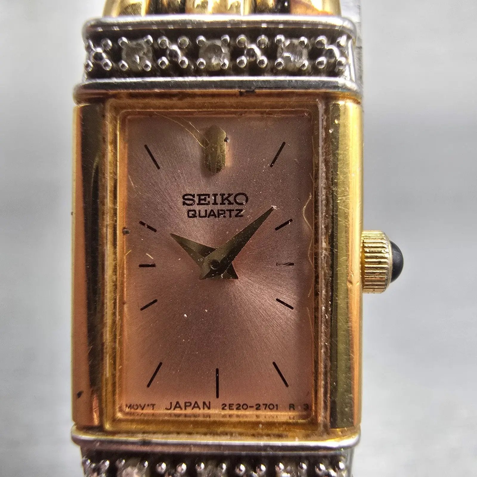Seiko Watch Women 13mm Pink Dial Gold Tone Diamonds Rectangle 2E20-7191 New Batt1