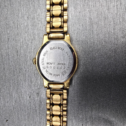 Seiko Watch Women 19mm Black Dial Gold Tone Round V401-0289 New Battery Vintage210