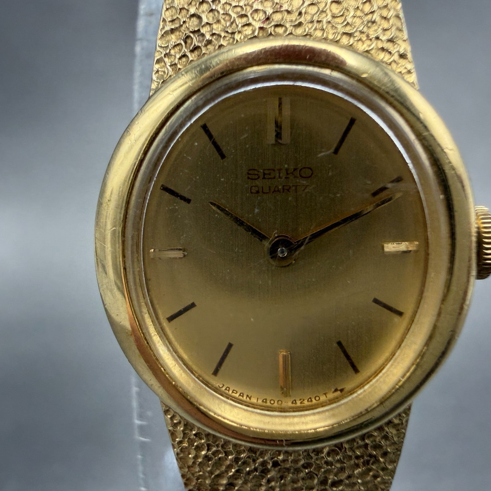 Seiko Watch Women 17mm Champagne Dial Gold Tone Oval 1400-7379 New Battery VTG1
