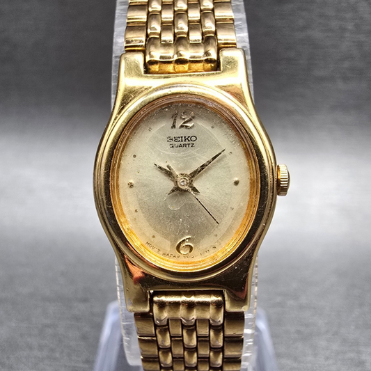 Seiko Watch Women 17mm Champagne Dial Gold Tone Oval V401-5109 New Battery JP10
