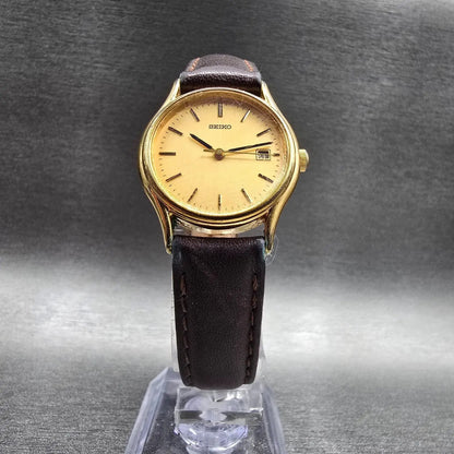 Seiko Watch Women 25mm Gold Dial Gold Tone Date Round V782-6E50 New Battery JP5