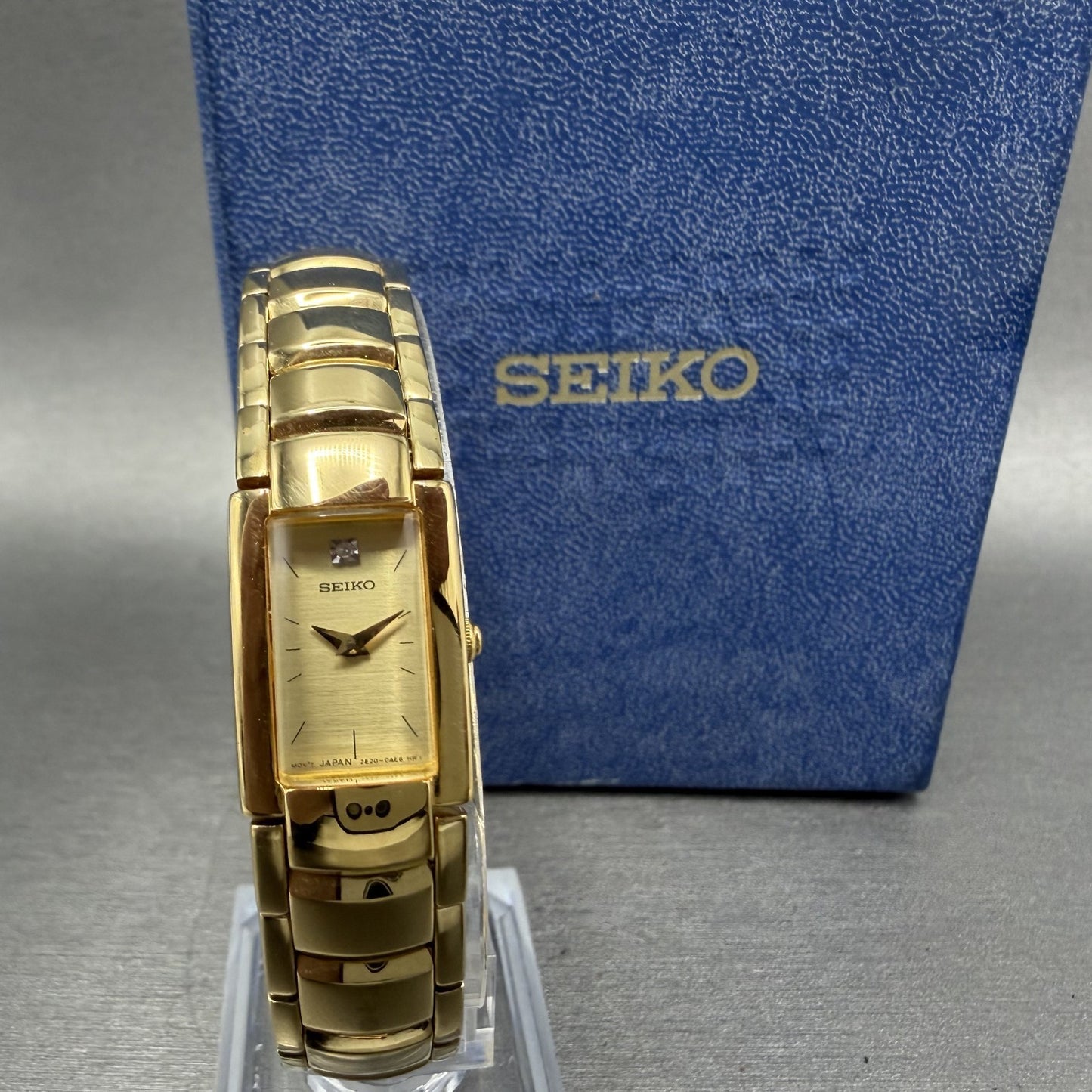Seiko Tank Watch Women 15mm Champagne Dial Gold Tone 2E200AF0 New Battery0
