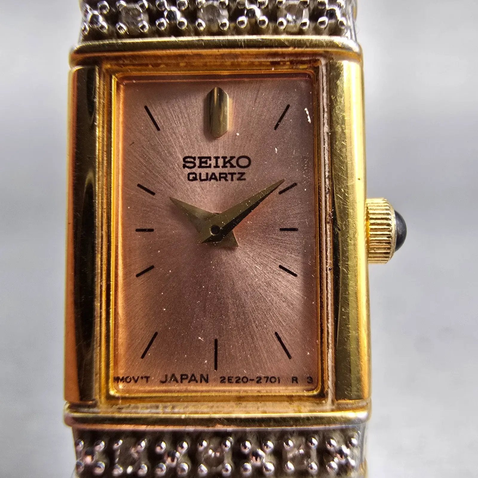Seiko Watch Women 13mm Pink Dial Gold Tone Diamonds Rectangle 2E20-7191 New Batt1