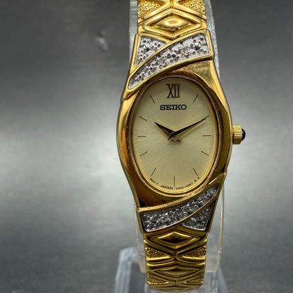 Seiko Watch Women 17mm Champagne Dial Gold Tone Oval V400-6559 VTG New Battey0
