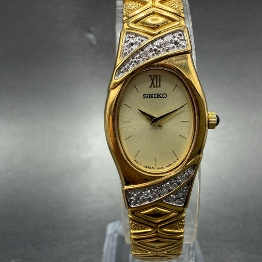 Seiko Watch Women 17mm Champagne Dial Gold Tone Oval V400-6559 VTG New Battey0