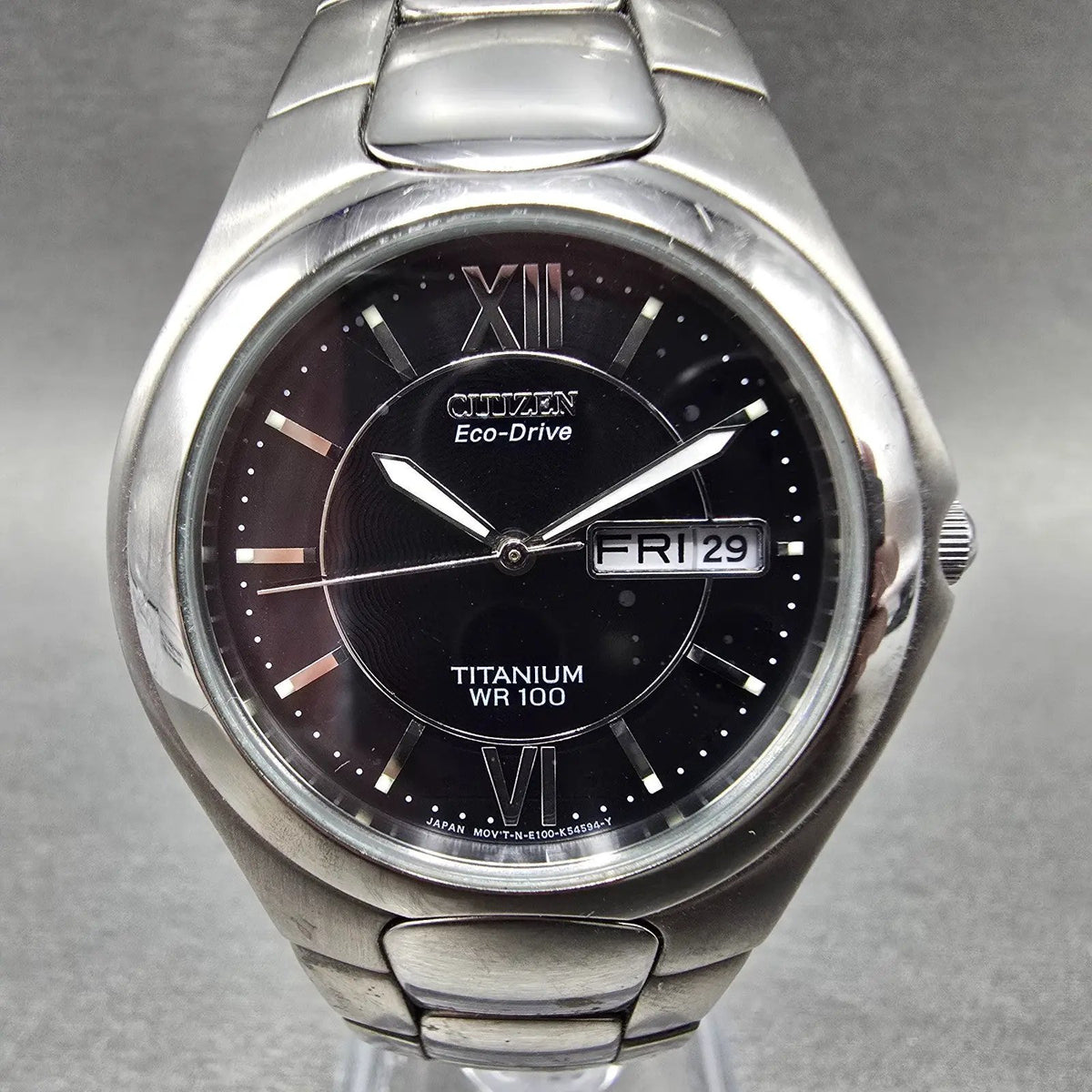 Citizen Eco-Drive Watch Men 36mm Black Dial Titanium Daydate E100-K18434 Runs JP0