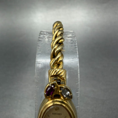 Seiko Watch Women 13mm Champagne Dial Gold Tone Oval 1E20-5760 New Battery Gems4