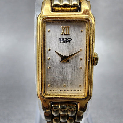 Seiko Tank Watch Women 13mm Silver Tone Gold Tone Rectangle 2e206859 NewBattery1