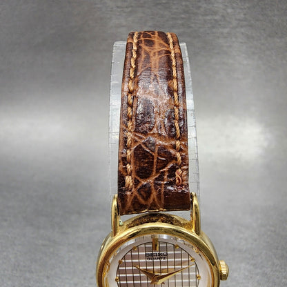 Seiko Watch Women 20mm Silver Dial Gold Tone Round 1N000F60 New Battery4