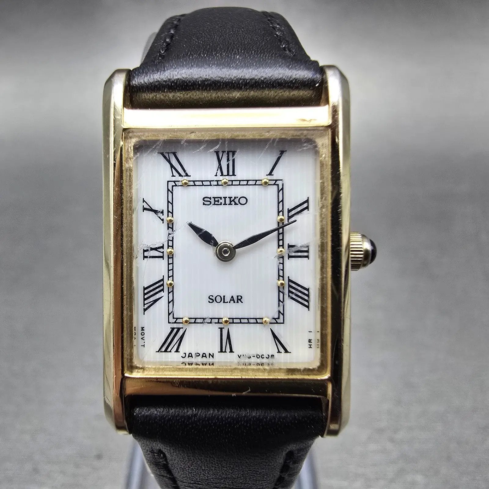 Seiko Solar Tank Watch Women 18mm White Dial Gold Tone V115-0BD0 Rectangle Runs0