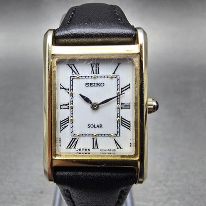 Seiko Solar Tank Watch Women 18mm White Dial Gold Tone V115-0BD0 Rectangle Runs0