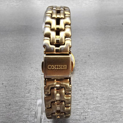 Seiko Watch Women 26mm Champagne Dial Gold Tone Date Round 7N82-0599 New Battery7