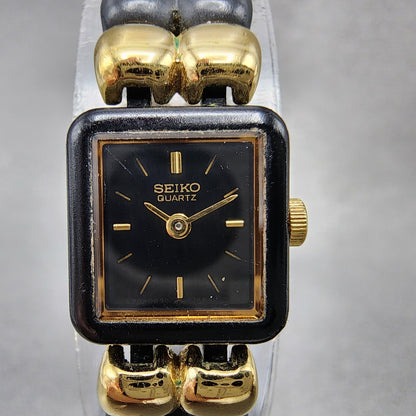 VTG Seiko Watch Women 14mm Black Dial Black Tone Rectangle 1E205540 New Battery1