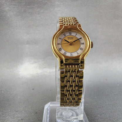 Seiko Watch Women 19mm White Dial Gold Tone Round V4010289 New Battery5
