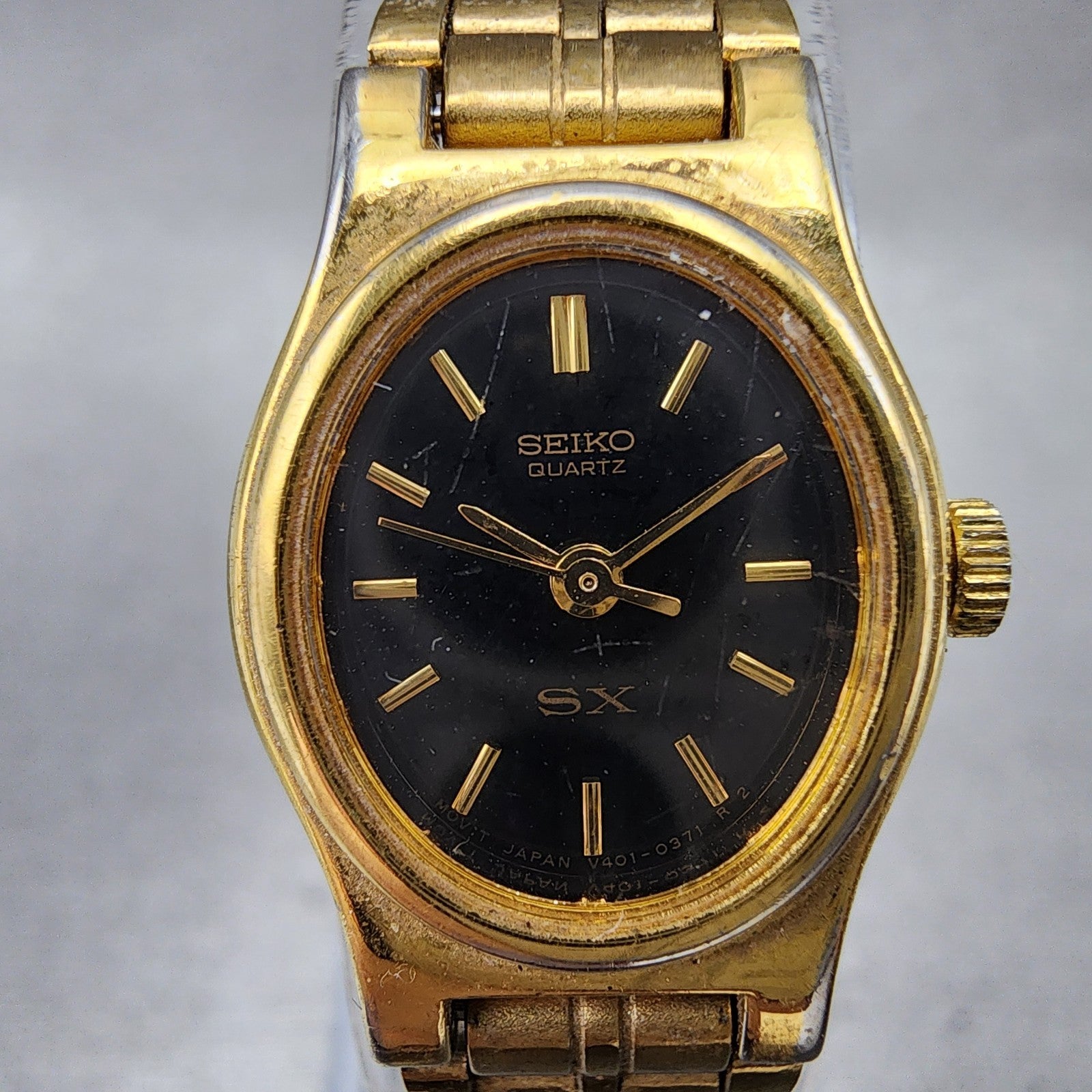 Seiko SX Watch Women 17mm Black Dial Gold Tone Oval V4015101 New Battery1