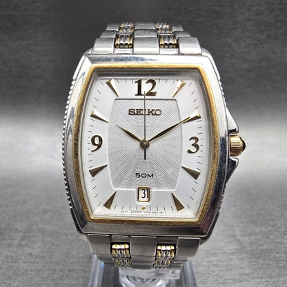 Seiko Watch Men 30mm Silver Dial Two Tone Date Rectangle 7N32-0CS0 New Battery0