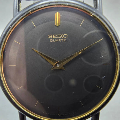 Seiko Watch Men 32mm Black Dial Black & Gold Tone Round 5Y30-7039 PARTS2