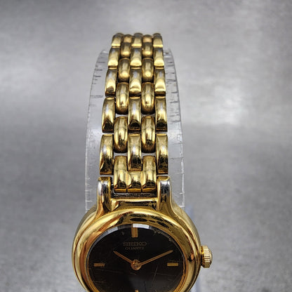 Seiko Watch Women 19mm Black Dial Gold Tone Round 1N00-0C49 New Battery