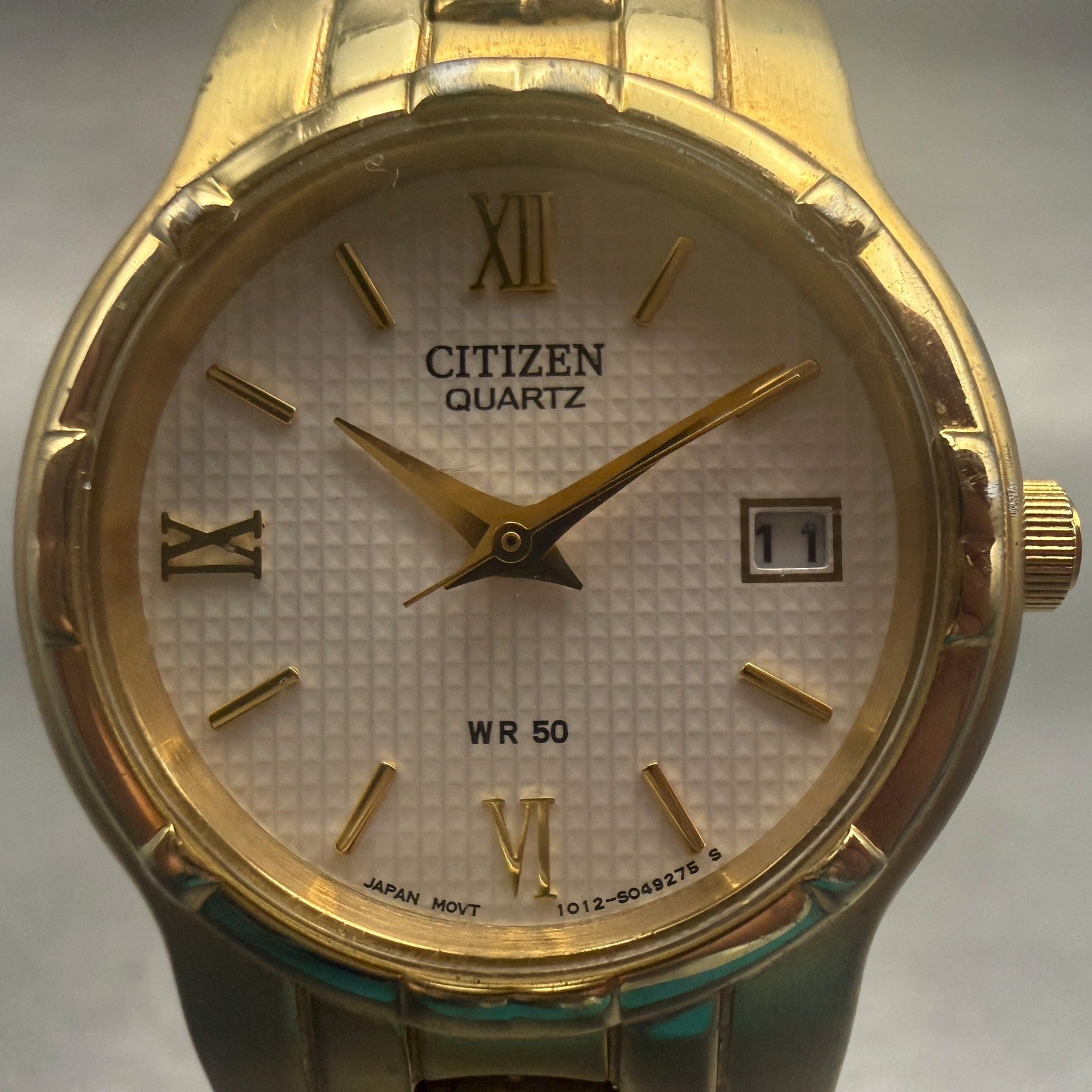 Citizen Watch Women 25mm Champagne Dial Gold Tone Date Round 1012-S029279 NewBat1