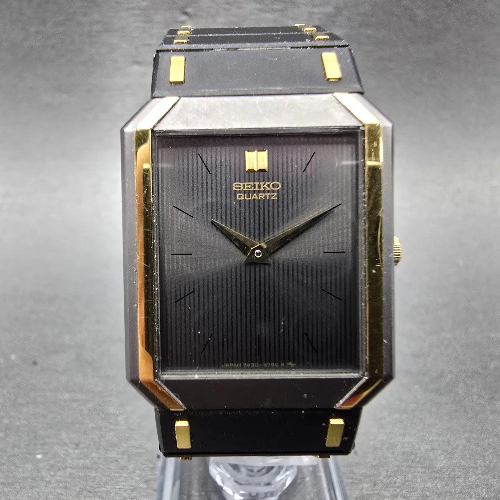 Seiko Tank Watch Men 26mm Black Dial Black & Gold Tone Rectangle 7430-5470 PARTS0