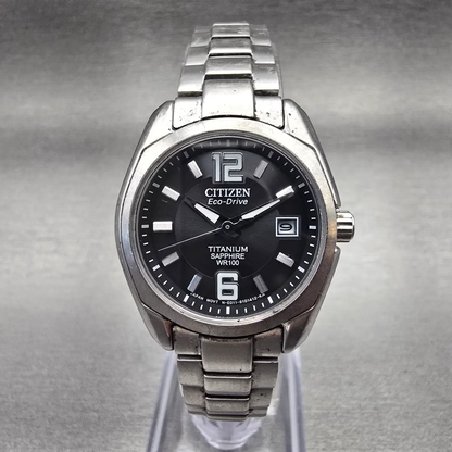 Citizen Eco-Drive Watch Women 27mm Black Dial Titanium Date E011-S068479 Runs0