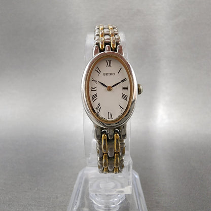 Seiko Watch Women 17mm White Dial Two Tone Oval V4001029 New Battery5