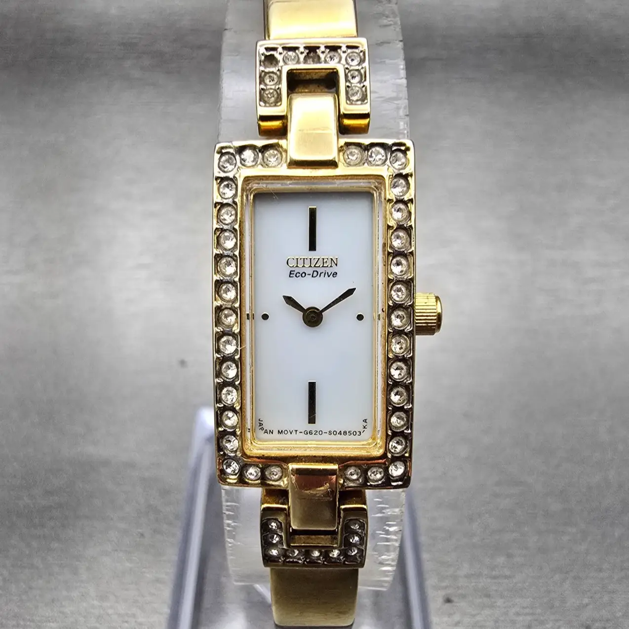 Citizen Eco-Drive Tank Watch Women 14mm White Dial Gold Tone Gemmed Bangle Works0