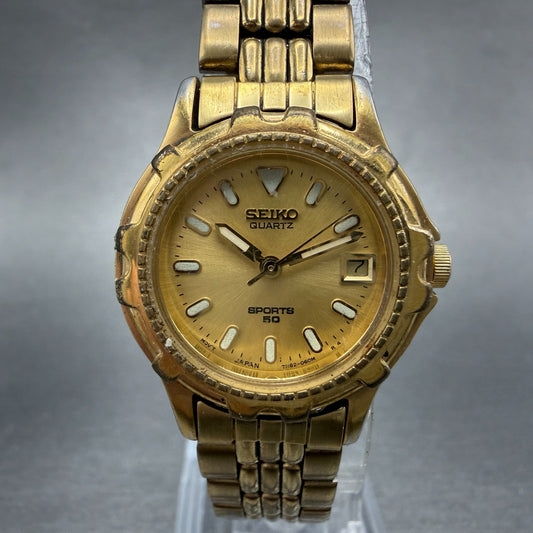 Seiko Sports 50 Watch Women 25mm Champagne Dial Gold Tone Date 7N82-0271 NewBatt0